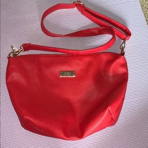 BCBG red crossbody bag with matching clutch